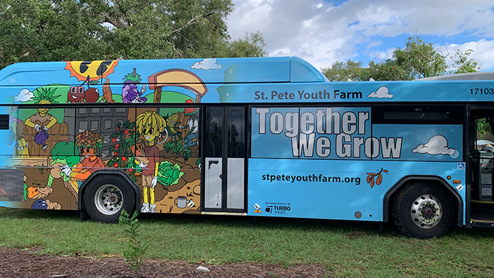 colorful bus with blue wrap design