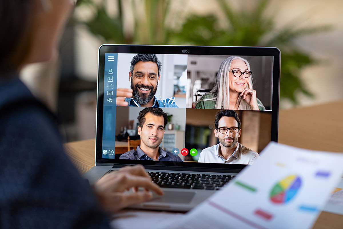 group of people on video chat on laptop