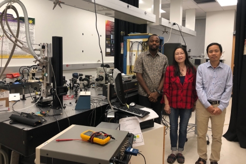 (From left) Emmanuel Olawale, graduate student, Dr. Xiaomei Jiang, associate professor, and Dr. Xuan Chung Nguyen, postdoctoral researcher, in the spintronic device research lab. (Photo courtesy of Dr. Xiaomei Jiang)