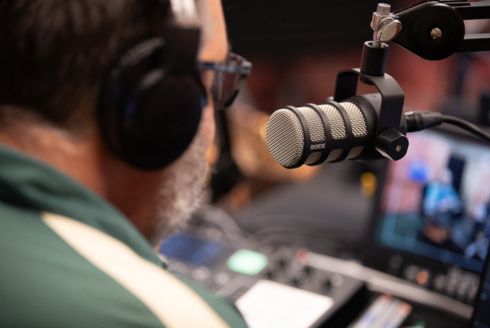 Professor Wayne Garcia recording an episode of By Conduct and Example. (Photo by Corey Lepak)