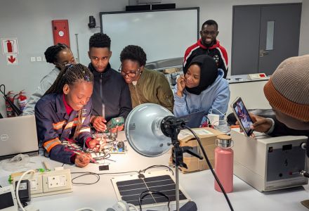 BIUST students applying the enhancements to the solar cell(s). (Photo courtesy of Sarath Witanachchi)