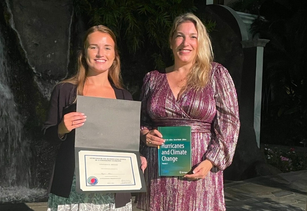 (From left) Geography master’s student Megan Blair with Dr. Jennifer Collins, professor in the School of Geosciences and lead organizer of the Hurricane Risk in a Changing Climate Symposium. (Photo courtesy of Jennifer Collins)