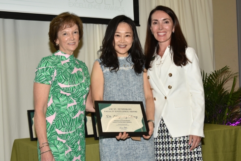 Dr. Miyoung Chong (center) is a recipient of the WLP’s  2024 Dr. Kathleen Moore Faculty Excellence Award. (Photo courtesy of Miyoung Chong)