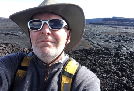 Dr. Jeffrey Ryan atop the Mauna Loa volcano in Hawaii. (Photo courtesy of Dr. Jeffrey Ryan)