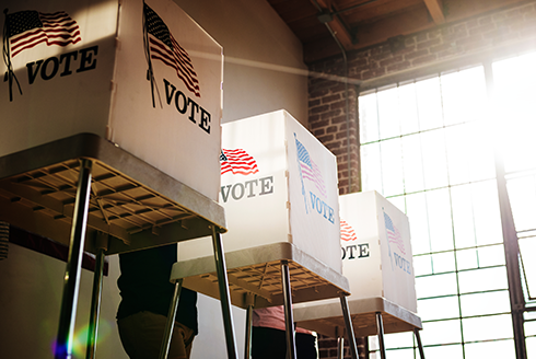 voting booths beside window