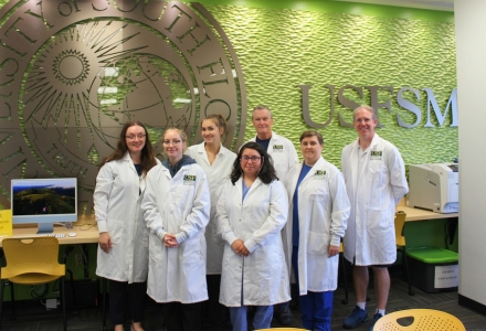 (From left) Dahlia Singer (student worker), Angelina Sacco (staff lab specialist), Abigail Pal (student worker), Scarleth Andino (student worker), Jim Fagan (adjunct professor and senior lab specialist), Karen Atwood (lab instructor), and Dr. Ryan McCleary (faculty instructor and lead biology faculty member of the Green Team). (Photo courtesy of Victoria Ramirez)