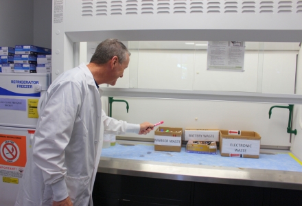 Senior Lab Specialist and Adjunct Professor Jim Fagan recycling a dry erase marker after his class. (Photo courtesy of Victoria Ramirez)