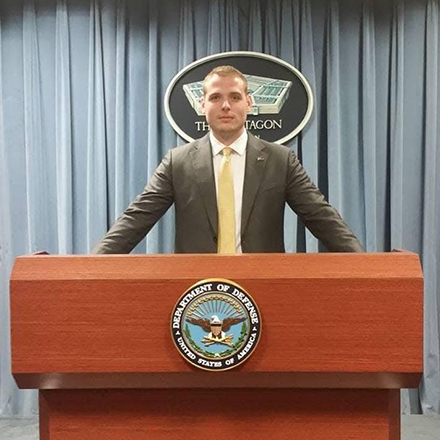 Kyle McIntyre standing at the podium in the Pentagon briefing room in 2017. (Photo courtesy of Kyle McIntyre)