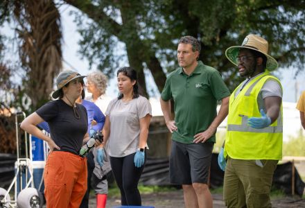 Wells (center) with students during the Research Experience for Undergraduates (REU) program this summer. (Photo by Corey Lepak)