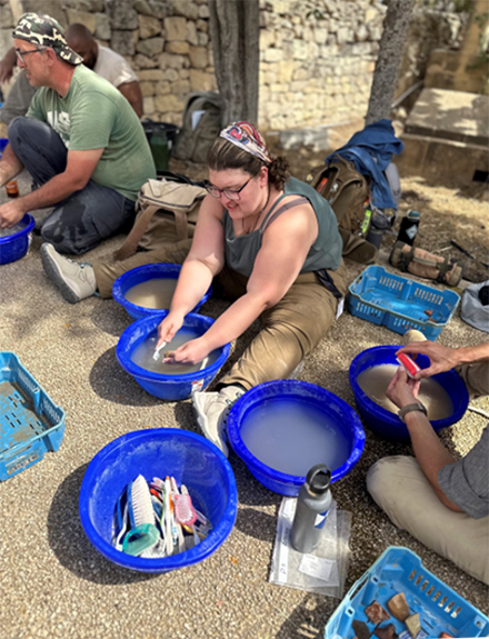 During their time on site, students reported finding teeth, bones, clay and mosaic tiles. (Photo courtesy of Davide Tanasi)