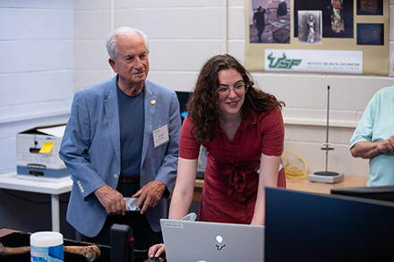 During their visit in the IDEx lab, the donors got to see firsthand how students and faculty use technology to scan, and therefore preserve, artifacts. (Photo courtesy of Davide Tanasi)