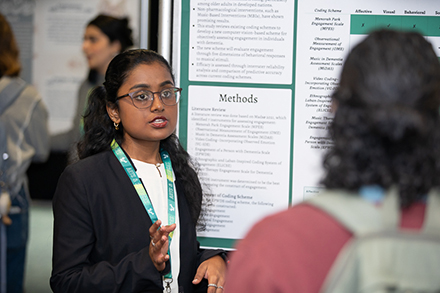 The attendees are encouraged to engage presenters in thoughtful discussions regarding their work, their research methods and the impact their results may have. (Photo courtesy of Corey Lepak)