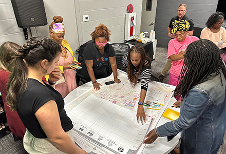 GIS Asset mapping workshop at the Dream Center with residents in East Tampa. (Photo courtesy of Will Schanbacher, PhD)