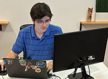 English major John Michael Kilgore interns with Florida-based software corporation, Oyova.