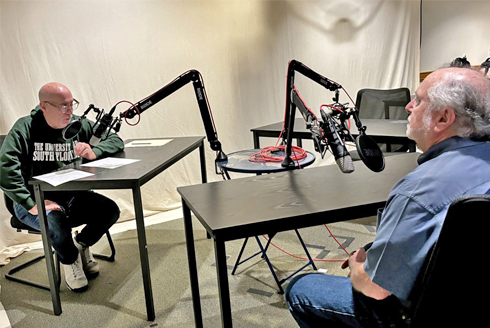 Adjunct professor Elliott Wiser from the Department of Journalism and Multimedia at USFSP interviewing guest for podcast. Photo courtesy of Elliott Wiser.