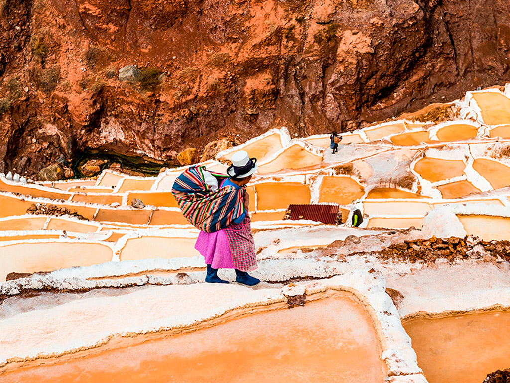 Peruvian carrying a bag