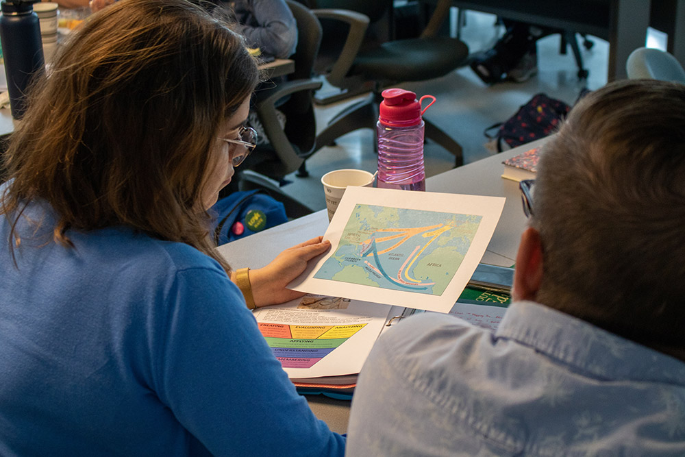 Dr. Reiter looking at a map