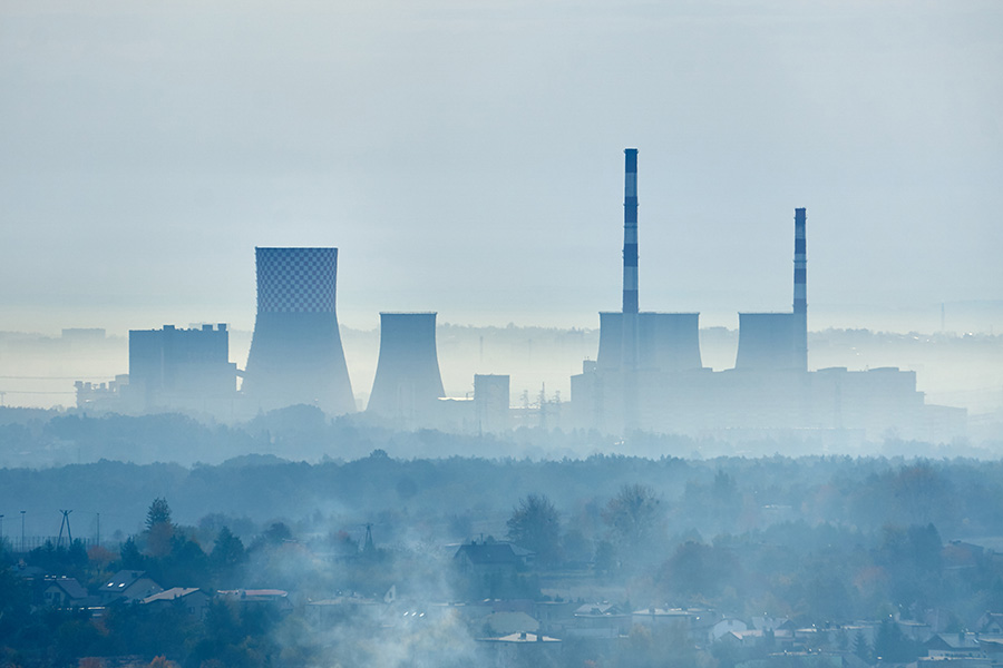 power plant in smoky landscape