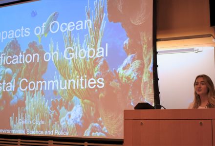 Caitlin Coyle, majoring in Environmental Science and Policy, speaks on: “Impacts of Ocean Acidification on Global Coastal Communities.” (Photo courtesy of Jade von Weder)