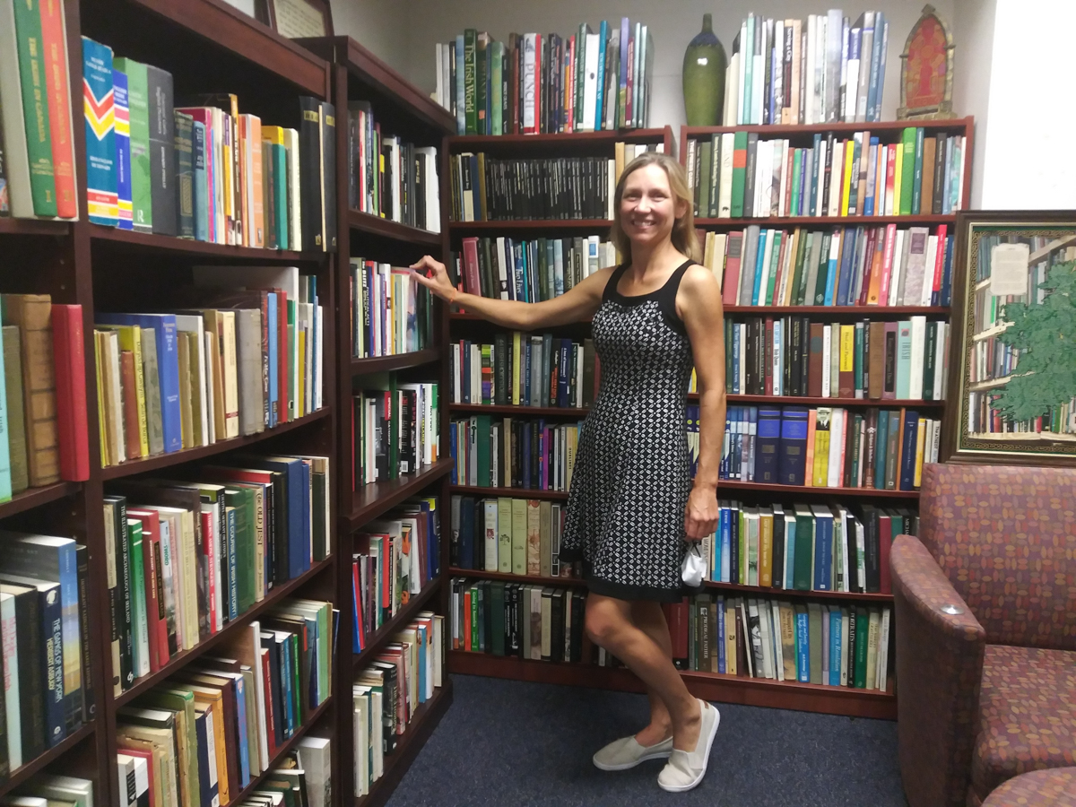 Jennifer Knight in the library stacks