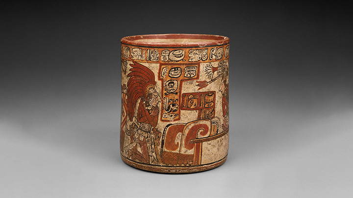 Maya cylinder vase (AD700-800) showing a king wearing a water lily headdress