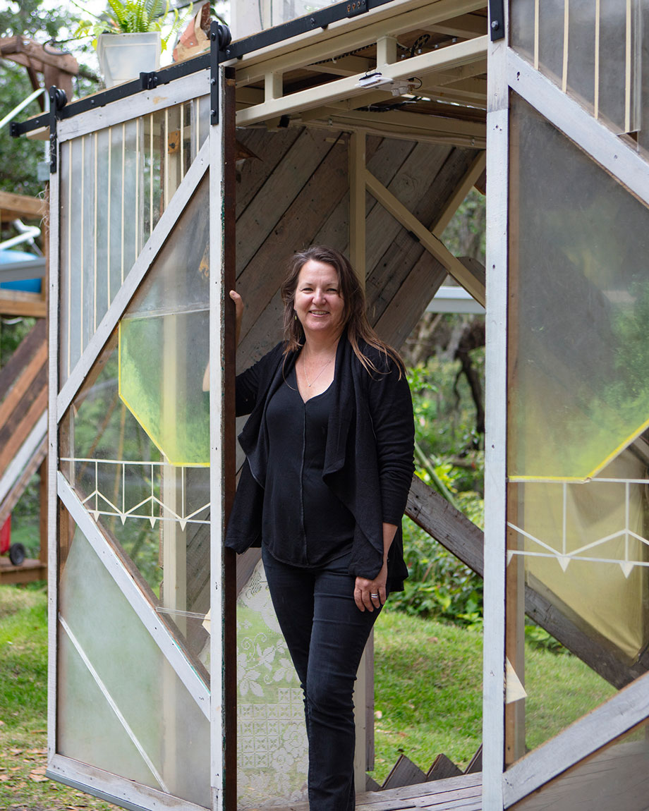 Sarah Howard stands in a structure.