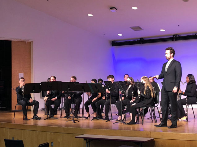 The Clarinet studio performs on stage.