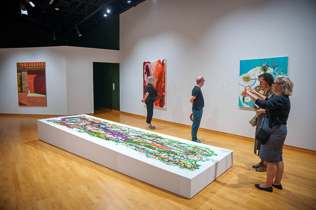 Visitors to the USF Contemporary Art Museum view Elisabeth Condon's work "Archipelago."