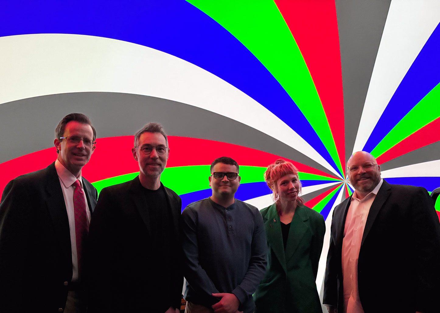 Pictured from left to right: John Graydon Smith, MOSI CEO; Andrew Scott Ross, director School of Art & Art History; Adrian Hermidas Otero, animation and motion design student; KJ Skidmore, studio art student; Chris Garvin, dean of the College of Design, Art & Performance. Photography by Jesus Gogo.