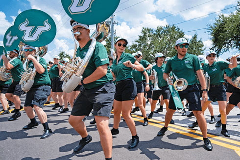 Brass musicians perform in the HOT Band Road Show, a pregame tradition at USF Football’s home games. [Photo: Christina Klein Photography]