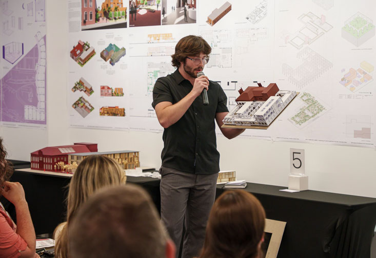 Daniel Mariani present "The Urban Garden" at the Re-Imagining West Tampa architecture event.