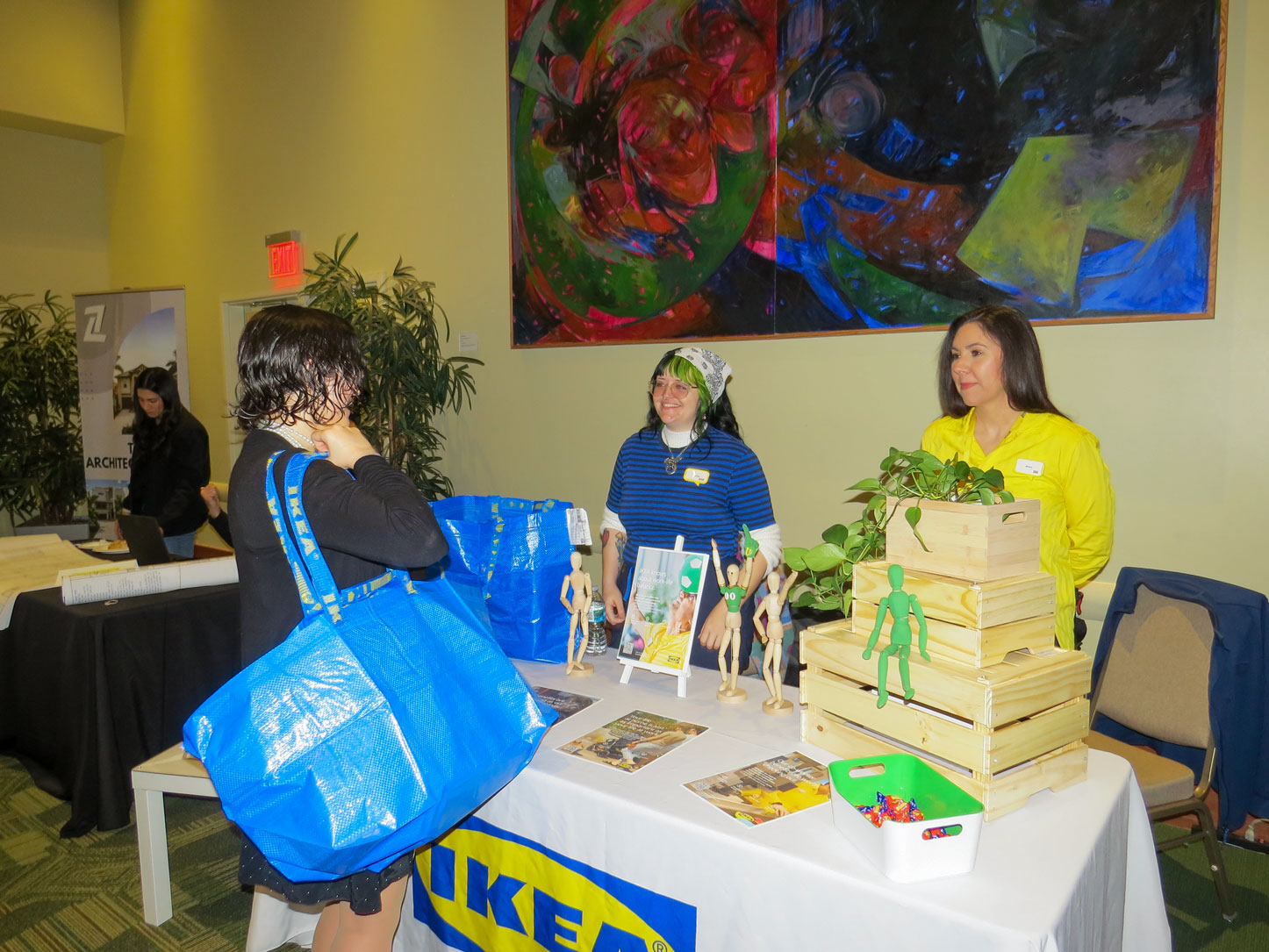 A student approches the IKEA table.