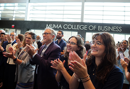 image of audience clapping