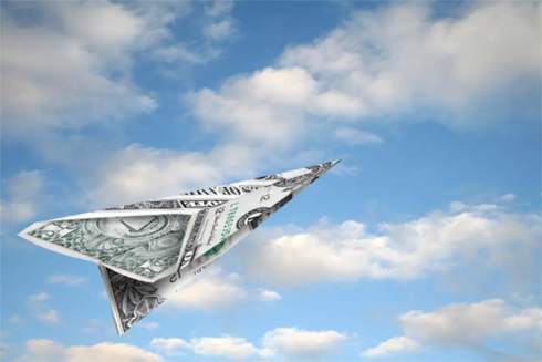 graphic image of a paper airplane made from a dollar bill