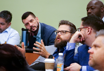 emba students listen to the speaker