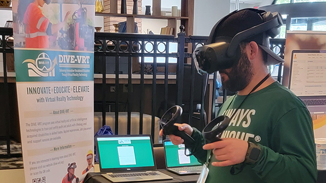 Conference attendee tests virtual reality headset