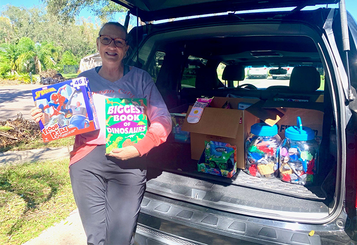 Christine Rover and car with supplies