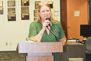 Debra Dobbs speaks to the group