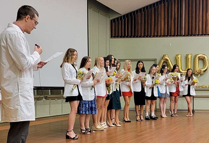 Students read the Audiology Oath