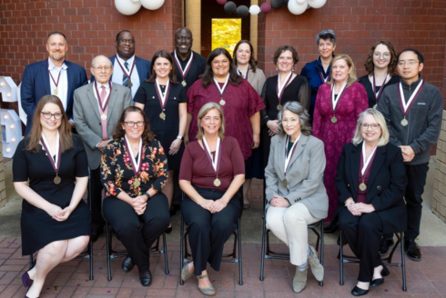 A group photo of Richard Dembo with other research fellows