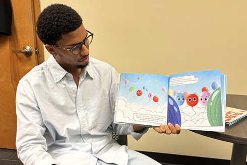 Jaylen Haggler reads the book he co-wrote