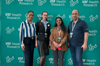 Layla and attendees at USF Health Research Day