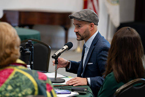 Dane Minnick speaks at a conference