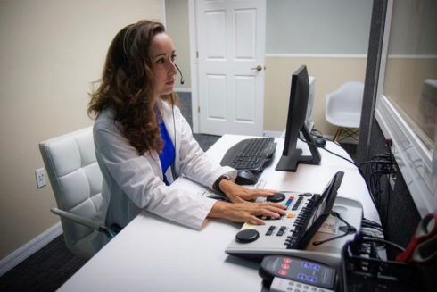 Madison Dowdy at an audiology clinical