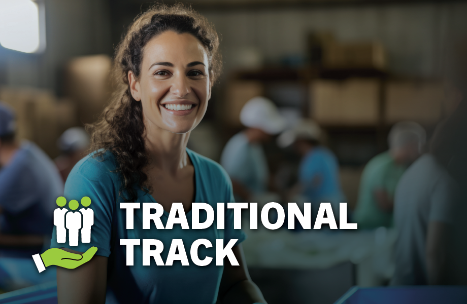 A person smiling to the camera, with text reading "Traditional Track"