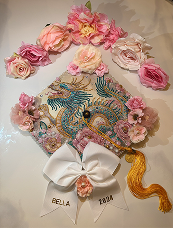 Grad cap with pink flowers and dragon - 1st Place - Isabella Galindo