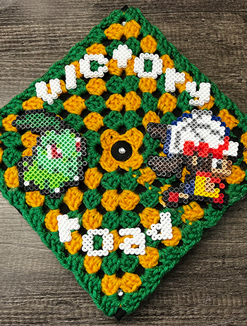 Grad cap with "victory road" - 3rd Place  - Susan Leyvas