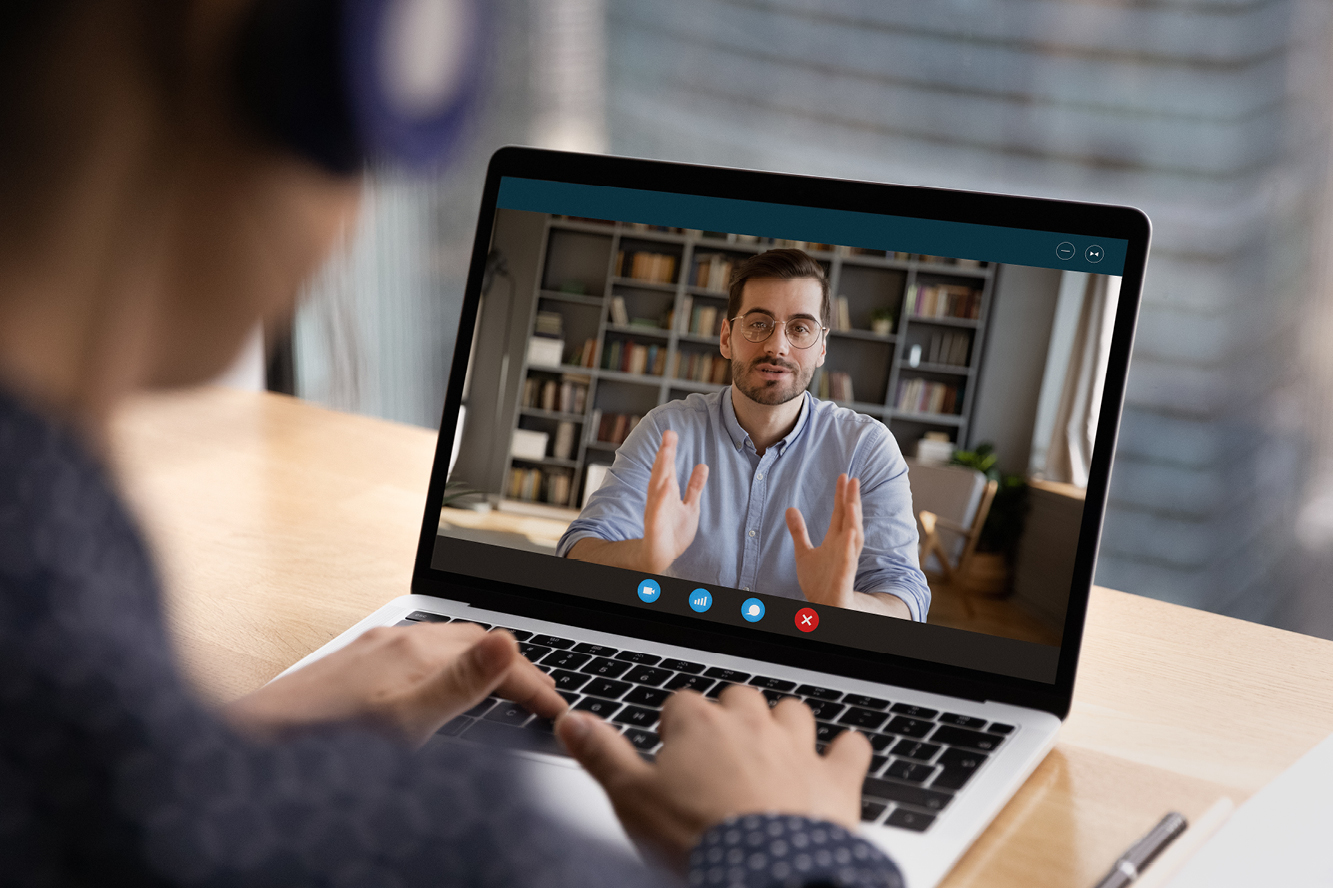 Two people having a virtual meeting with each other