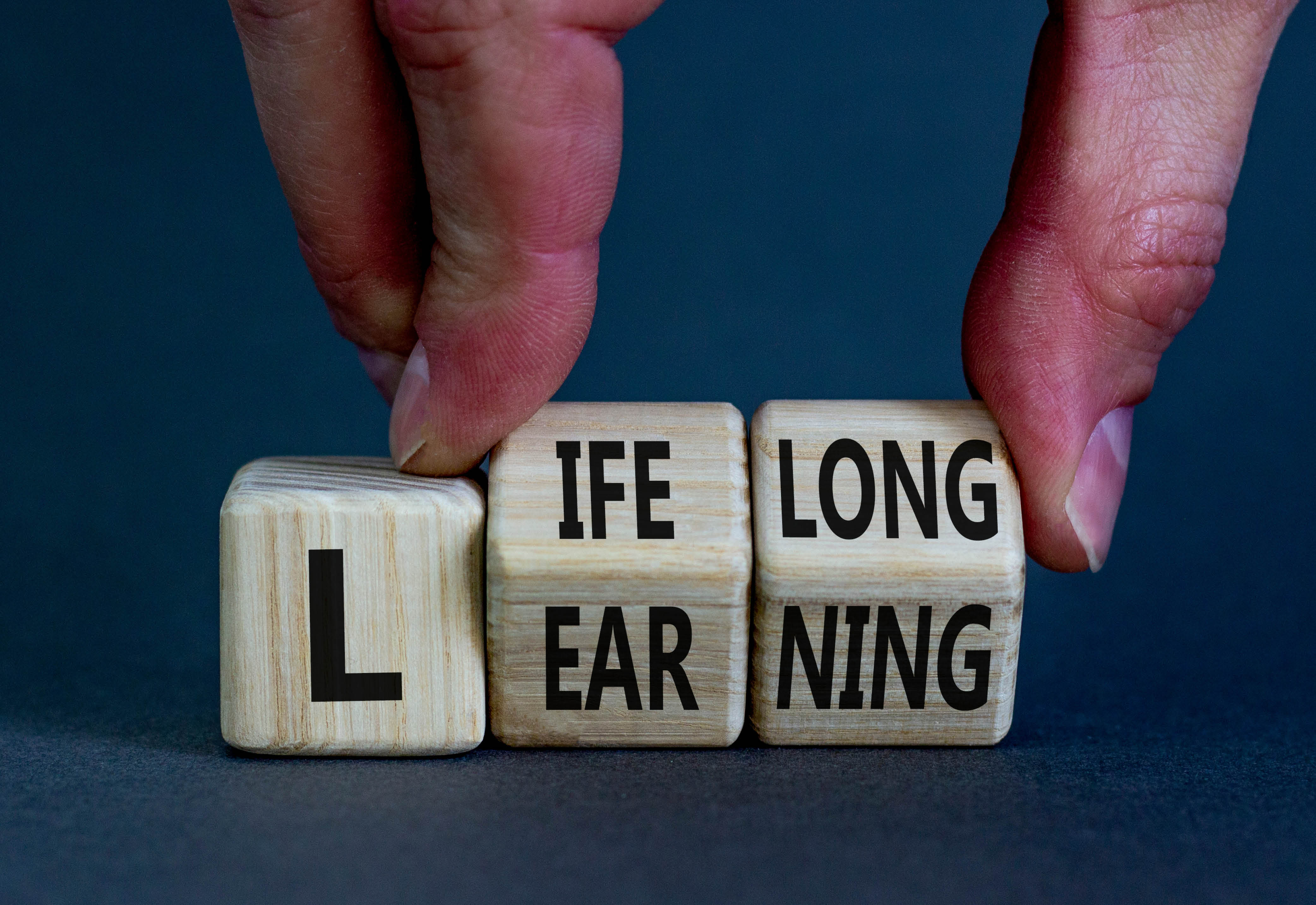 Wooden blocks spelling out Lifelong Learning