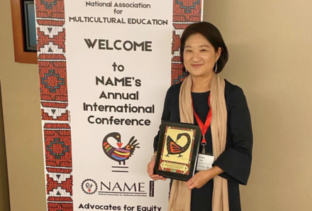 Sophia Han with her award at the 2024 NAME Annual International Conference.